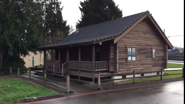 Rustic cabin with covered porch