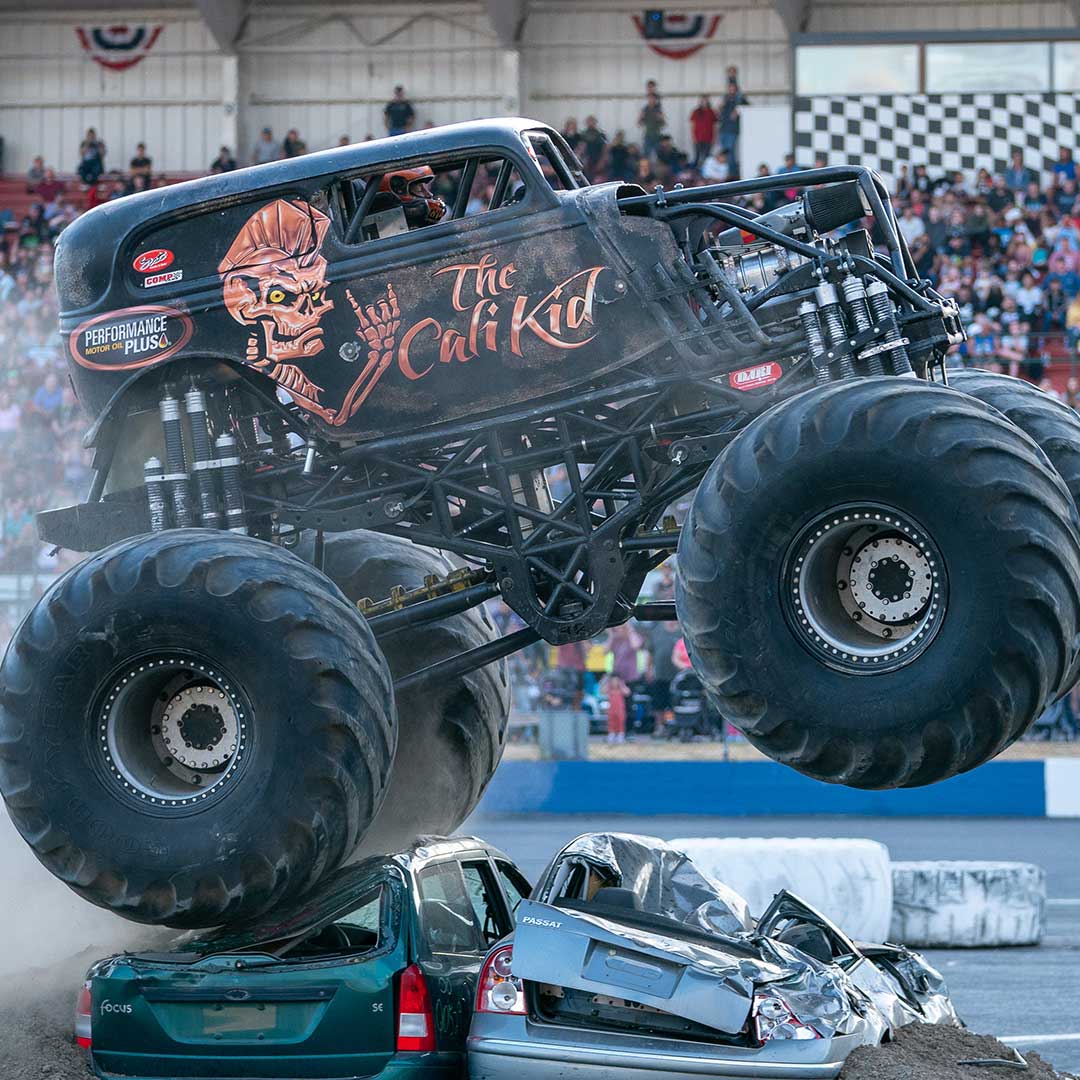 image of monster truck, Cali Kid in a jump
