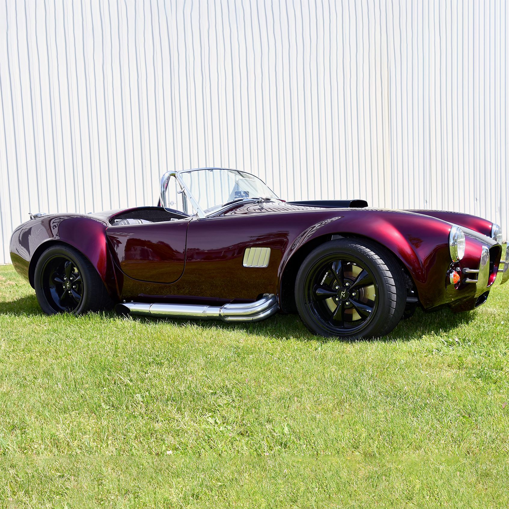 red vintage corbra car